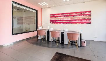 How much does a manicure cost in a mid-range salon